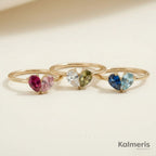 Three Liora Rings with different birthstone combinations
